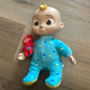 COCOMELON singing/talking doll. Everything works and there is no damage to it.